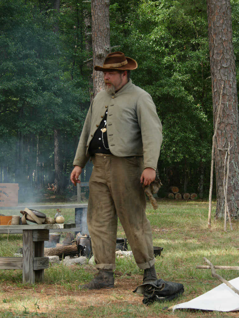 A Confederate reenactor in a "butternut" uniform. Northern soldiers called Confederates “butternuts” because of the tan-grey color of the uniforms.