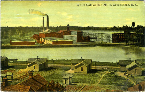 Postcard shows the White Oak Cotton Mills (a division of Greensboro-based Cone Mills) and several houses in the mill village. A river runs between the mill and the village.