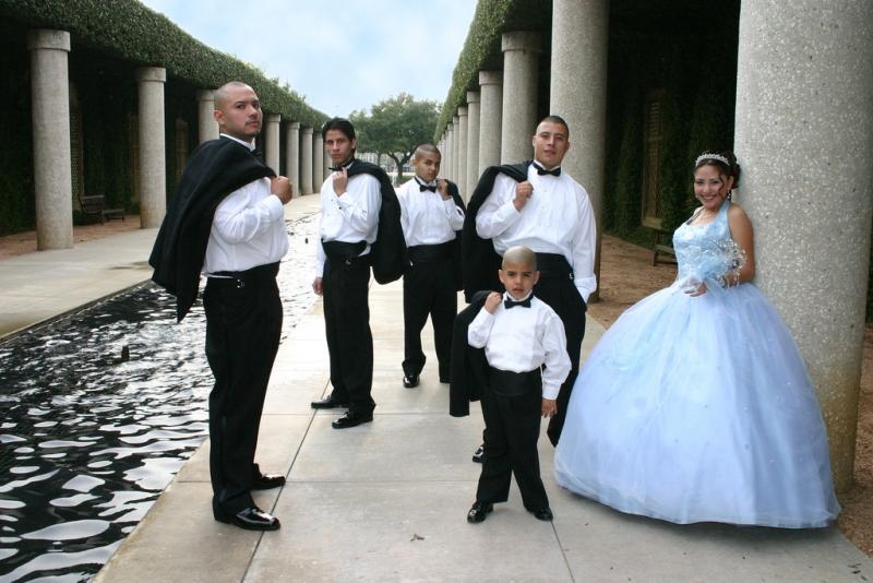 <img typeof="foaf:Image" src="http://statelibrarync.org/learnnc/sites/default/files/images/10laquinceaneraandthegentlemen.JPG" width="1024" height="683" alt="Quinceañera and gentlemen" title="Quinceañera and gentlemen" />