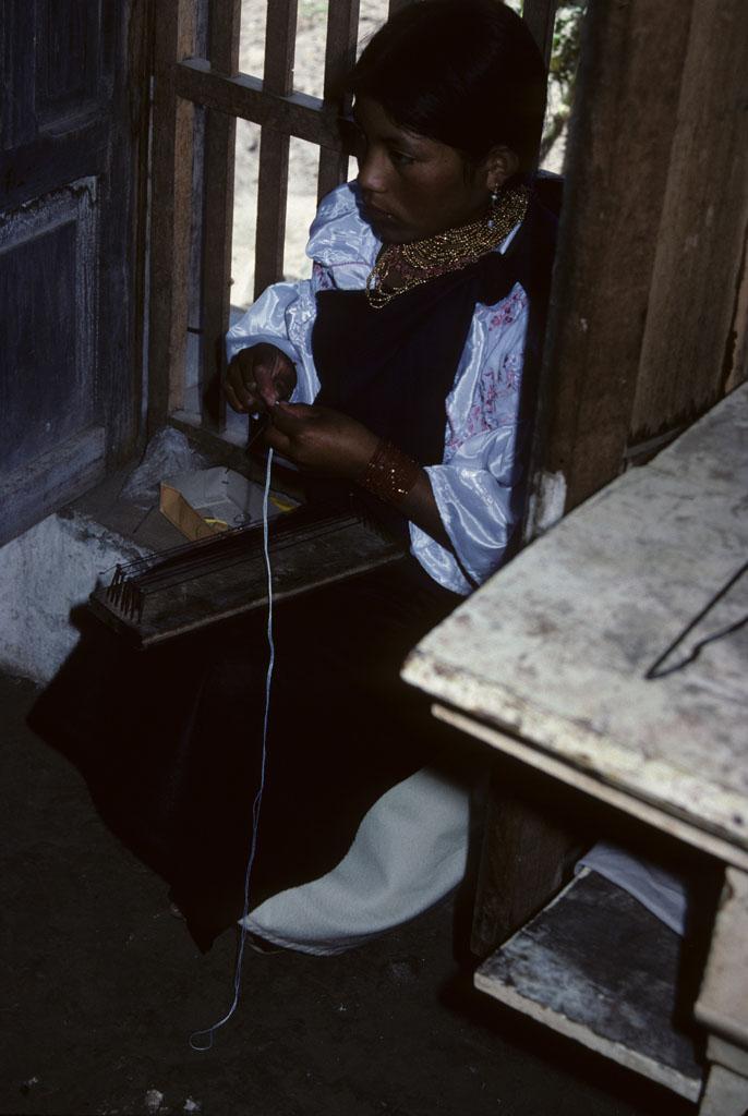 <img typeof="foaf:Image" src="http://statelibrarync.org/learnnc/sites/default/files/images/ecuador_171.jpg" width="686" height="1024" alt="Weaving a bracelet in Otavalo, Ecuador" title="Weaving a bracelet in Otavalo, Ecuador" />