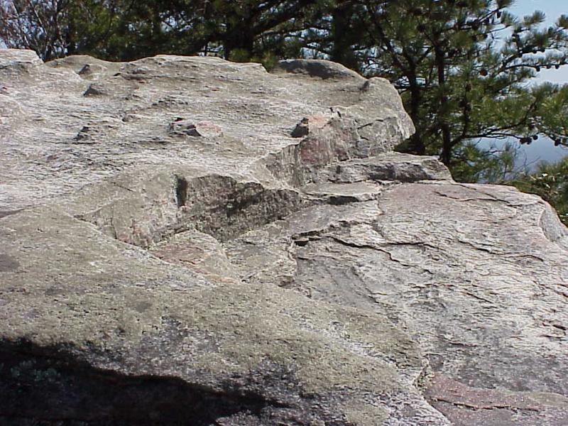 <img typeof="foaf:Image" src="http://statelibrarync.org/learnnc/sites/default/files/images/erosion.jpg" width="1024" height="768" alt="Erosion Pilot Mountain" title="Erosion Pilot Mountain" />