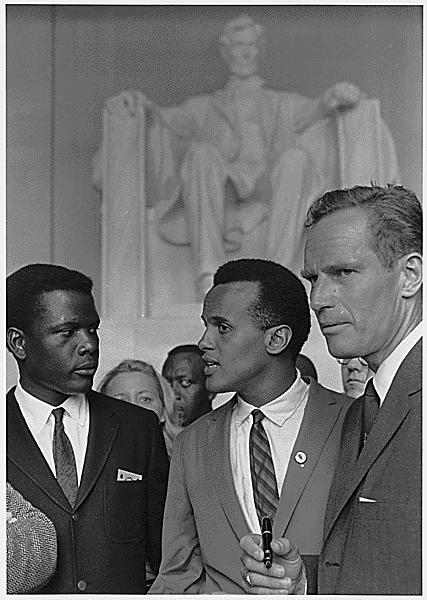 <img typeof="foaf:Image" src="http://statelibrarync.org/learnnc/sites/default/files/images/heston-poitier-belafonte.jpg" width="427" height="600" alt="Sidney Poitier, Harry Belafonte, and Charlton Heston" title="Sidney Poitier, Harry Belafonte, and Charlton Heston" />