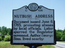 This is an image of the NC Highway Historical Marker for the Nutbush Address, located at NC 39 at Townsville in the County of Vance.
