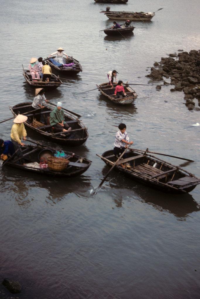 <img typeof="foaf:Image" src="http://statelibrarync.org/learnnc/sites/default/files/images/vietnam_028.jpg" width="683" height="1024" alt="Women and children rowing small boats in the harbor at Cat Ba" title="Women and children rowing small boats in the harbor at Cat Ba" />