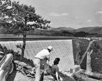 A view of the Fontana Dam and powerhouse, 1950s. North Carolina Collection, University of North Carolina at Chapel Hill Library.