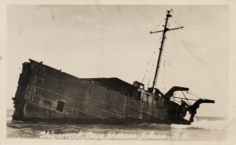 'Shipwreck, Cape Hatteras Island, N.C.' postcard of an unidentified shipwreck, circa 1929. Image from the Durwood Barbour Collection of North Carolina Postcards, North Carolina Collection of the University of North Carolina at Chapel Hill.
