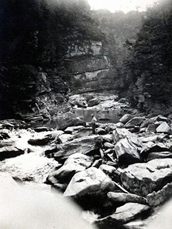 T. B. Wilson fishing in the Linville Gorge, 1919. Image from the North Carolina Museum of History.