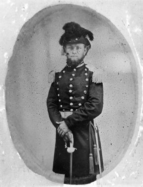 (2nd) Lieutenant Charles B. Cook, Confederate, Fayetteville Independent Light Infantry, early Civil War era, in uniform showing fancy hat and sword. Image courtesy of the State Archives of North Carolina, call #: N_59_12_95.