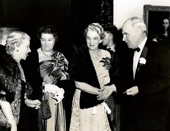 Photograph taken at the opening of the North Carolina Museum of Art showing (left to right) Lady Marcia Cunliff Owen, Mrs. Robert Lee Humber, Mrs. Luther Hodges, and North Carolina Governor Luther Hodges. 