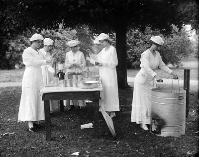 "Home Demonstration of Canning, Mrs. Jane McKimmon, ca. 1908-1917." Photo by H. H. Brimley.