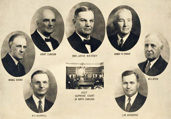 The Supreme Court of North Carolina for 1937: W. P. Stacy, M. V. Barnhill, Michael Schenck, Heriot Clarkson, George W. Connor, W. A. Devin, and J. W. Winborne. Image from the North Carolina Museum of History.