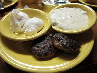 Country breakfast- eggs, grits, sausage, from Tupelo Honey Cafe, Asheville, North Carolina. Image courtesy of Flickr user Frivolous_accumulation.