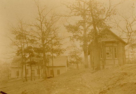 "The first two school buildings of Cullowhee High School, about 1891. The building on the left is the first schoolhouse. On the right is the Music and Art Building." Image courtesy of Western Carolina Library Digital Collections. 