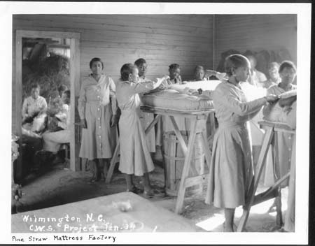 Emergency Relief Administration. 1934. "Women making mattresses in Wilmington in 1934." NCERA Photographs 1934-1936. State Archives of North Carolina. Box 144.