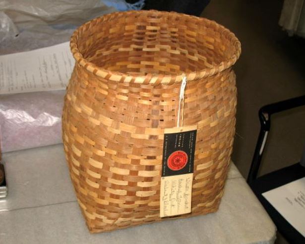 Photograph of handmade basket, made by Rachel Tooni, ca. 1973-1980, Qualla Arts and Crafts Board. Item H.2008.5.1 from the North Carolina Museum of History. Used courtesy of the North Carolina Dept. of Natural and Cultural Resources. 