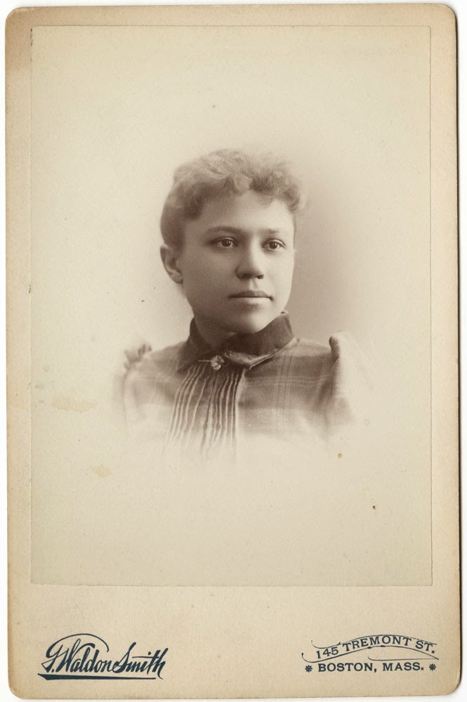Cabinent card photograph of Dixie Lee Bryant, taken at the G. Walden Smith Art Studio in Boston in 1891. This image is from Bryant's scrapbook and courtesy of University of North Carolina at Greensboro's University Archives.