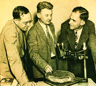 A photograph of professors (l to r) James G. Lester, Haywood Pearce, Jr., and Ben W. Gibson examining the first Dare Stone. Image courtesy of Brenau University, Gainesville, Ga.