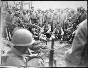 Marines receiving instruction in the Demolition Course at Montford Point Camp, February 1945.  Image from the National Archives and Records Administration, presented on Wikimedia Commons. 