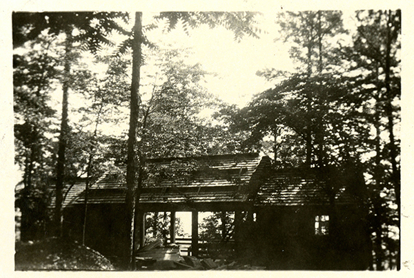 Photograph of picnic shelter at the top of Morrow Mountain, 1944. The shelter was built in the late 1930s by the Civilian Conservation Corps and is typical of the rustic style created by WPA projects of the New Deal era. From the State Parks Collection, NC Digital Collections.