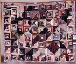Log Cabin pattern quilt, made by Patience White, ca. 1907, Alamance County, N.C.  From the collections of the North Carolina Museum of History, used courtesy of the North Carolina Department of Cultural Resources. 