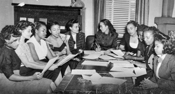 A meeting of the Phyllis Wheatley YWCA in Charlotte, ca. 1940s. Founded in 1916, the Phyllis Wheatley Branch was the first African American YWCA branch in the United States. Photograph courtesy of Floretta Douglas Gunn. Carolina Room, Public Library of Charlotte and Mecklenburg County.