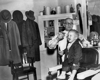 A North Carolina barber at work (date unknown). Courtesy of North Carolina Office of Archives and History, Raleigh.