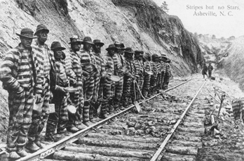 Chain gang working on a railroad near Asheville, 1915. Copied from a postcard. Courtesy of North Carolina Office of Archives and History, Raleigh. Call no. N_71_9_145.