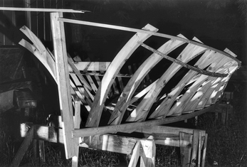 Boat in the early stages of construction at the Lewis Brothers boat works on Harkers Island, 1992. Copyright Edwin Martin, 1992. North Carolina Collection, University of North Carolina at Chapel Hill Library.