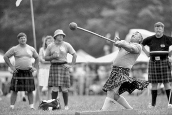 The hammer throw at the Highland Games on Grandfather Mountain. Photograph by Hugh Morton.