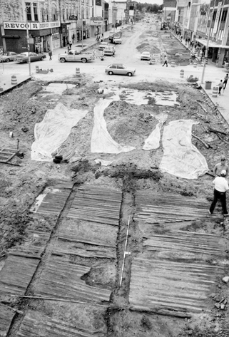 A section of the Western Plank Road discovered by archaeologists in 1984 during street excavations in Fayetteville. Photograph courtesy of Kenneth W. Robinson.