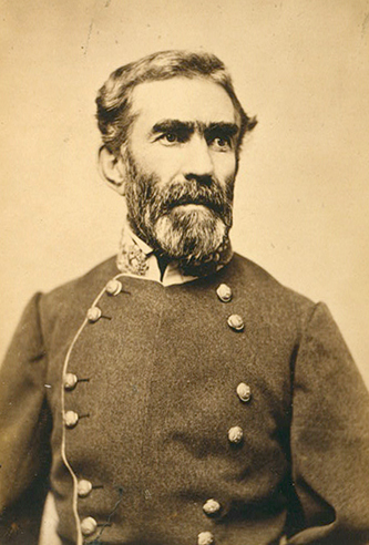 Sepia photograph of Braxton Bragg. He is pictured with soldier's coat. He has medium hair, with thick eyebrows and beard.
