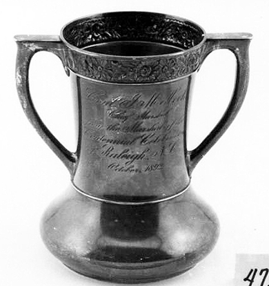 A cup presented to Jonathan M. Heck by the city of Raleigh in 1892 during its centennial celebration. Image from the North Carolina Museum of History.