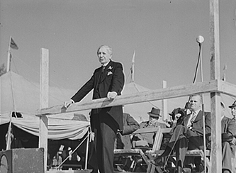 Governor Clyde R. Hoey speaking at the Caswell County Fair, October 1940. Image from the Library of Congress.