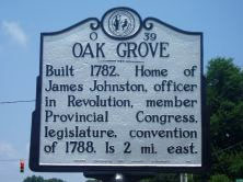 North Carolina Historical Highway Marker for Oak Grove, at Lucia in Gaston County.  Oak Grove was the home of James Johnston.  Used courtesy of the North Carolina Department of Cultural Resources. 