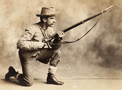 Fred A. Olds dressed and posing as a Civil War soldier in a 1908 photograph. Image from the North Carolina Museum of History.