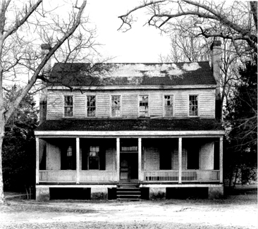 Photograph of the Stewart-Hawley-Malloy House in Stewartsville, near Laurinburg, North Carolina.  Image from the National Register of Historic Places Inventory-Nomination Form for the Stewart-Hawley-Malloy House, June 2, 1975.  The house was built for James Stewart circa 1800. 