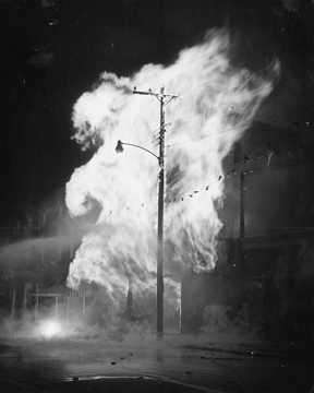 Storms, Fire in Mt. Gilead, NC, 1959, electrical pole on fire at night. From Carolina Power and Light Photograph Collection, NC State Archives, call #:  PhC68_1_457. 