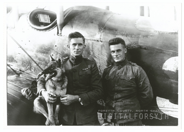 Maynard Belvin with his dog, Trixie, and mechanic, William Kline
