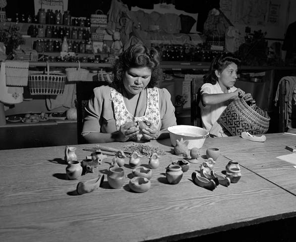 Woman making pottery, 1947