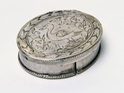 "This engraved patchbox, ca. 1720, was used to hold small pieces of fabric that women used as fashion accessories. The maker is unknown." Image available from the NC Museum of History. 