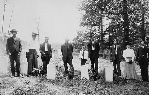 "Wiseman Family at graves of brothers and sisters." Frank W. Bicknell Photograph Collection, PhC.8, North Carolina State Archives, Raleigh, NC. call #: PhC8_179.